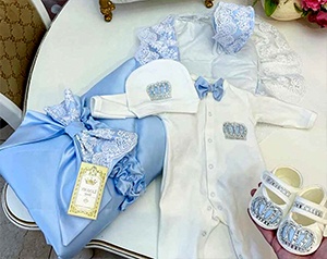 Наборы одежды для новорождённых на выписку